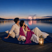 Couple on a lakeside dock watching fireworks at dusk, American Dream experience gift