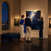 Guide showing a couple a painting on a private after-hours gallery tour, Art Tours experience gift
