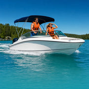 Couple piloting a rented runabout across a turquoise lake, Boat Rentals & Self-Drive experience gift