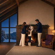 Family hanging a stocking on a garlanded cabin mantel at dusk, Holiday Traditions experience gift