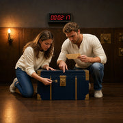 Couple racing the clock, turning a key in a locked chest as the countdown glows, Escape Rooms experience gift