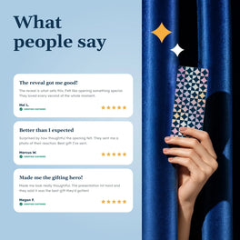 Three five-star Everwow reviews about the gift reveal, beside a hand holding a gift card through a blue velvet curtain