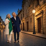 Grandparents arm in arm on a lamplit cobblestone heritage lane, Heritage Tour experience gift