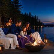 Family toasting marshmallows over a fire bowl on a lake dock, Family Getaway experience gift