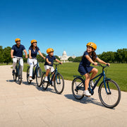 Family cycling the mall path toward a distant white dome, Family Fun in Washington DC Experiences experience gift