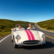 Father and adult son driving a classic convertible on a country road, Father's Day Experiences experience gift