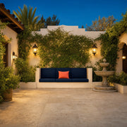 Boutique hotel courtyard with a stone fountain and warm lanterns, Hidden Gem experience gift