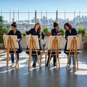 Four friends painting at easels in a sunlit studio, Girls Day Out in San Francisco Experience Collection experience gift