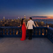 Newlyweds on a hotel terrace above Manhattan at dusk, Honeymoon in New York City Experience Collection experience gift