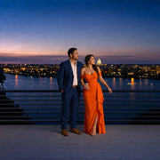 Newlyweds standing close at a rooftop rail above the river, Honeymoon in Washington DC Experiences experience gift