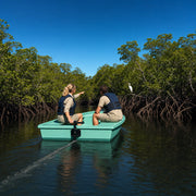 Guide pointing out an egret from a quiet boat in a mangrove channel, Mangrove & Eco Boat Tours experience gift