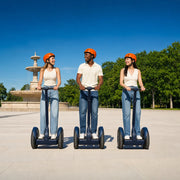 Three friends gliding across a sunlit plaza on segways, Segway Tours experience gift