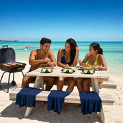 Three friends eating grilled shrimp at a beach BBQ table after snorkeling, Snorkel & Lunch Combo experience gift