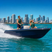 Couple driving a speedboat across turquoise Biscayne Bay near Miami, Speedboat Rental experience gift