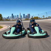 Two go-karts racing through a banked curve below the skyline, Los Angeles Thrilling Experience Collection gift
