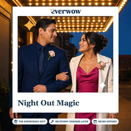 Everwow Night Out Magic experience gift card: couple walking past a lit theatre marquee at night